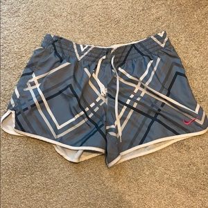 Blue Nike workout shorts, size M